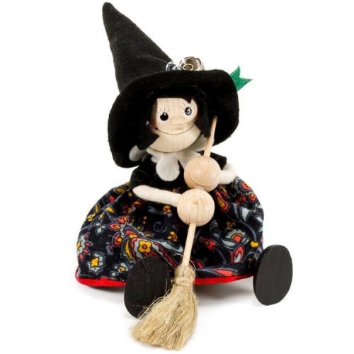 Rugós figura (boszi, fekete kalappal, fekete ruhában)